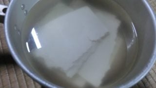 Sake lees put in water for half a day