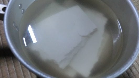 Sake lees put in water for half a day