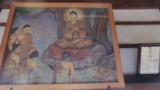 お釈迦様の最初の説法の様子。転法輪の絵
