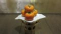 How to place the correct persimmon to the Buddha